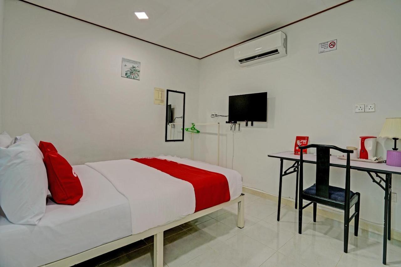 Capital O 90423 Teratai Chalet Hotel Kampong Raja Kültér fotó